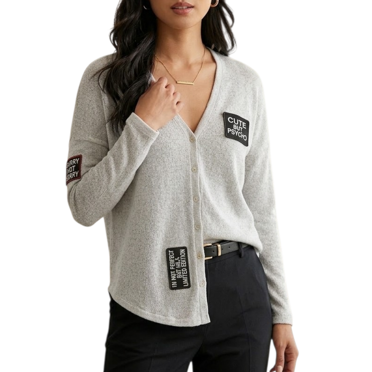 Woman wearing a gray cardigan with patches on a white background